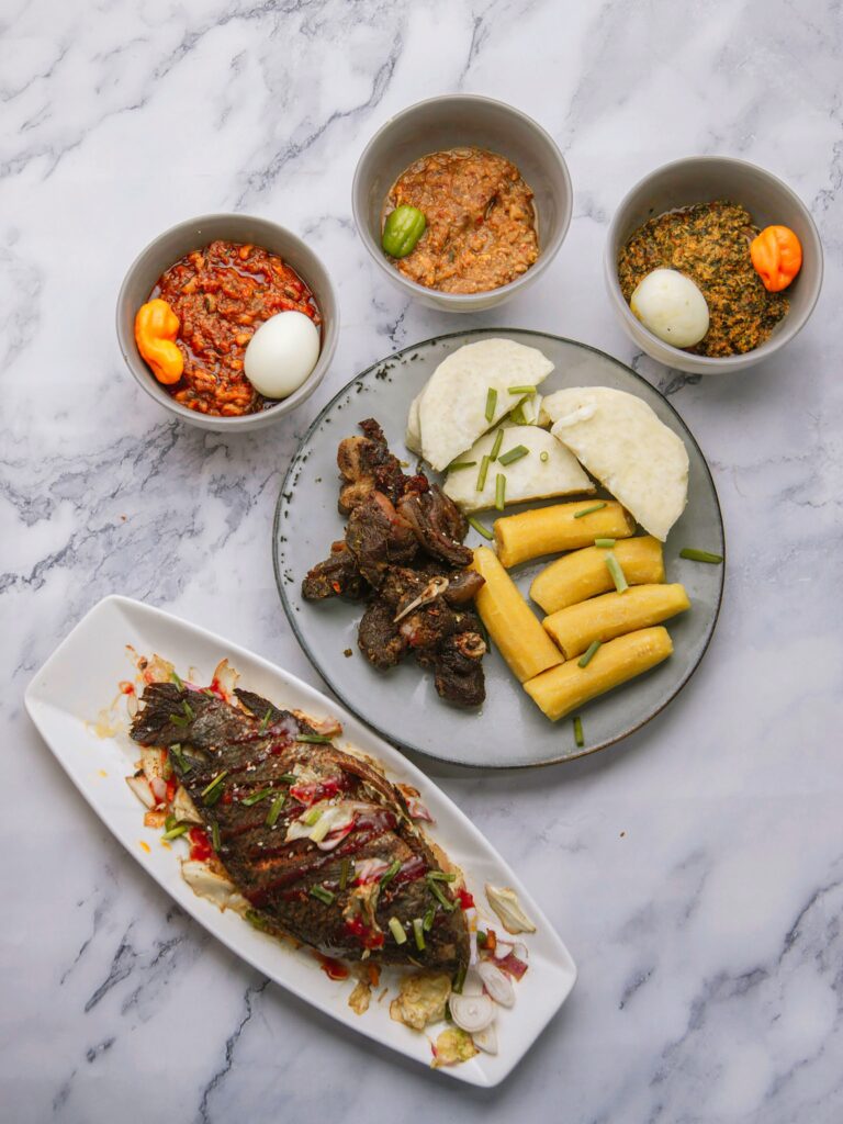 Traditional food in Ghana served on many plates