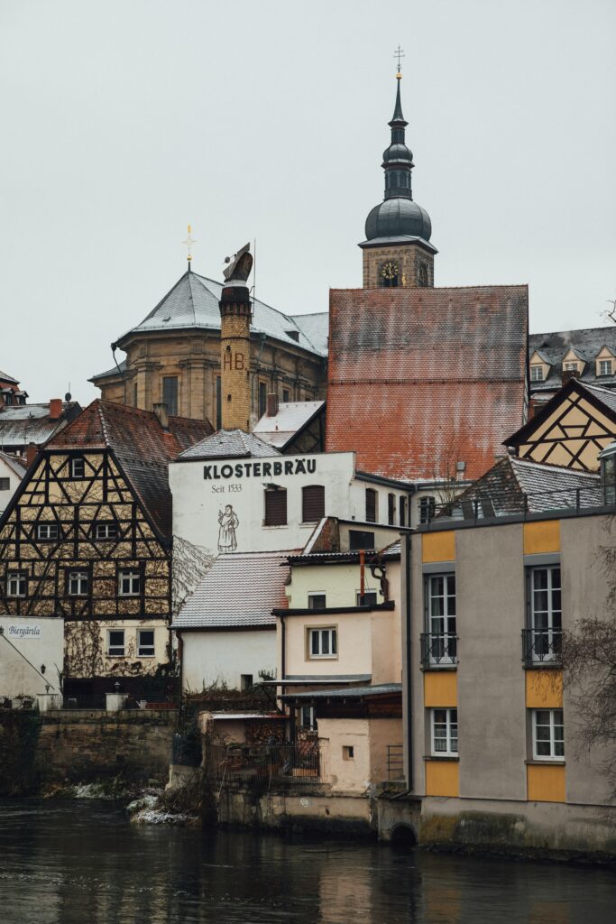 View of several buildings and a church in Bamberg's old town
